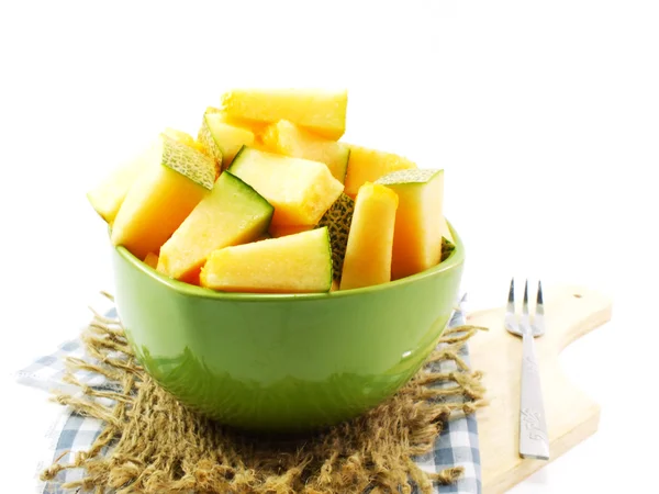 Melón melón jugoso sobre un fondo de mesa de madera —  Fotos de Stock