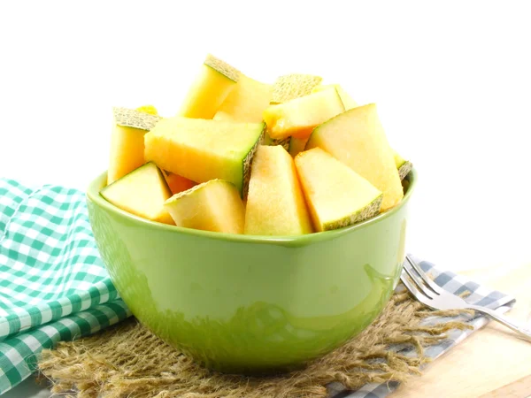 Melón melón jugoso sobre un fondo de mesa de madera —  Fotos de Stock