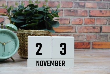 Ahşap Takvim 23 Kasım 'ı gösteriyor. 23 Kasım Ayının Günü