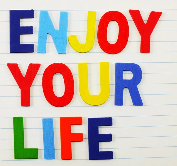 Cieszyć się twój życie concep wykonane z kolorowy alfabet — Zdjęcie stockowe