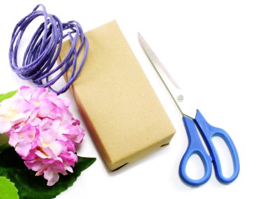 wrapping presents and accessories on white background