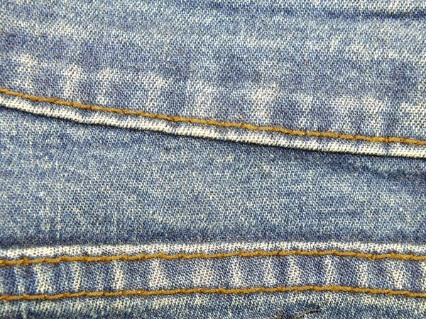 Blå jeans textur med sömmar bakgrund — Stockfoto