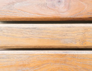 Koyu kahverengi ahşap tahta arka plan ile.