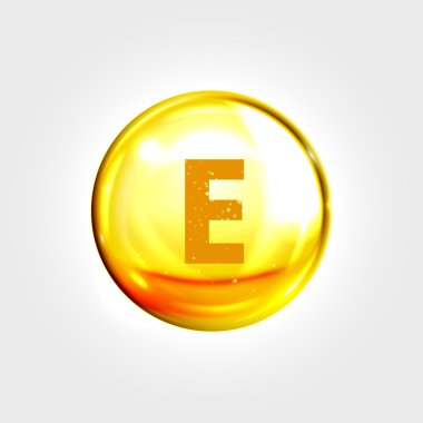 E vitamini altın simgesi. Tokoferol hap kapsülü