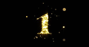 Bir numaralı simli altın. Parlak ışık ve siyah arkaplanda parlak kıvılcımlar