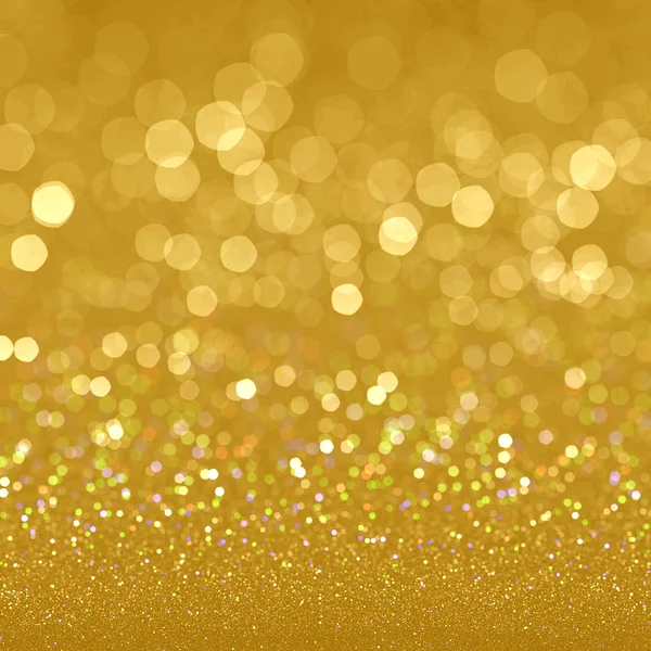 Golden festive glitter background with defocused lights — Stock Photo, Image