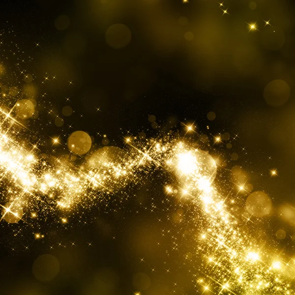 Złotych gwiazd błyszczących kurz ogon — Zdjęcie stockowe