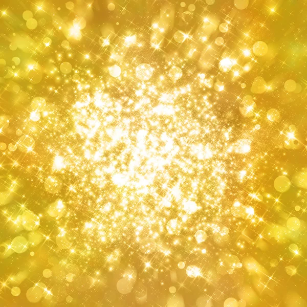 Glittrande stjärnor på golden glittrande bakgrund — Stockfoto