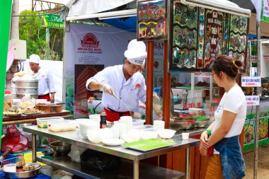 Hochiminh City, Vietnam - May 28, 2015: a food stall in the food fair at Dam Sen Park in Hochiminh City, Vietnam