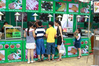 Hochiminh City, Vietnam - May 28, 2015: a food stall in the food fair at Dam Sen Park in Hochiminh City, Vietnam
