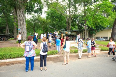 Hochiminh City, Vietnam - July 8, 2015: Tourists are watching the first tanks burst through the gates of the Independence Palace at the end of Vietnam War April 30th, 1975 at Ho Chi Minh City, Vietnam. After April 30, 1975 is known as Reunification P