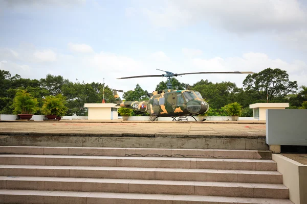 Hochiminh City, Vietnam - July 8, 2015: Independence Palace with helicopter UH-1 in Ho Chi Minh City, Vietnam. After April 30, 1975 is known as Independence Palace Reunification Palace