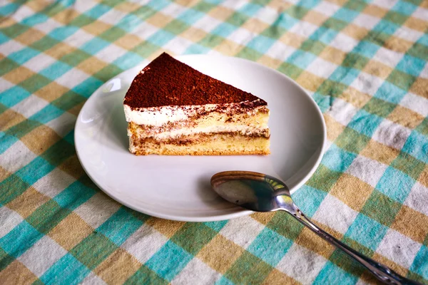 Chocolate cake on white dish — Stock Photo, Image