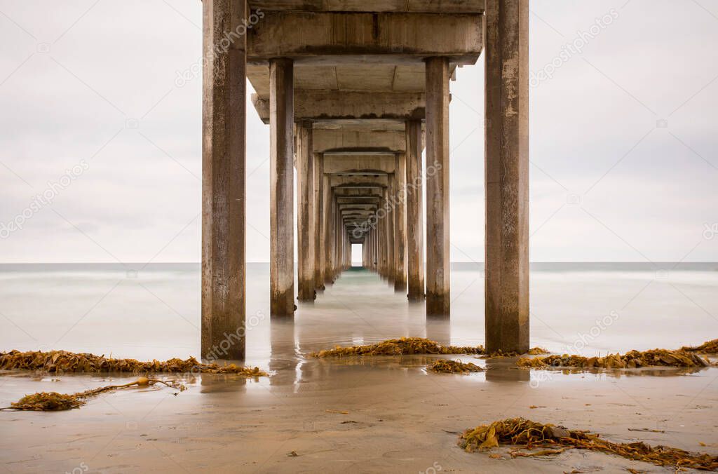 Scripps Pier in La Jolla, California. Long exposure during early morning on an overcast day.