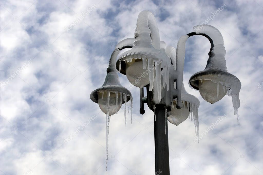 A street lamp after a winter ice storm.