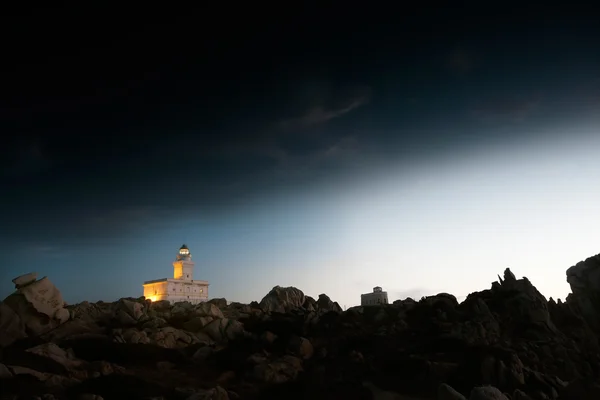 Capo Testa lighthouse at dusk — Stock Photo, Image