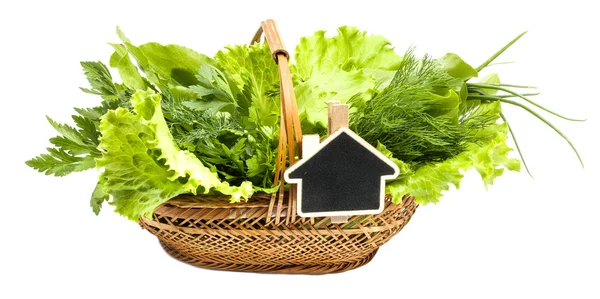 Herbs in a braided wooden basket on white background with the inscription — Stock Photo, Image