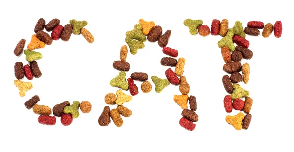 Multicolored inscription  made of dry pet food — Stock Photo, Image