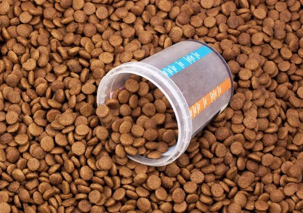 Marrón seco gato o perro alimentos fondo —  Fotos de Stock