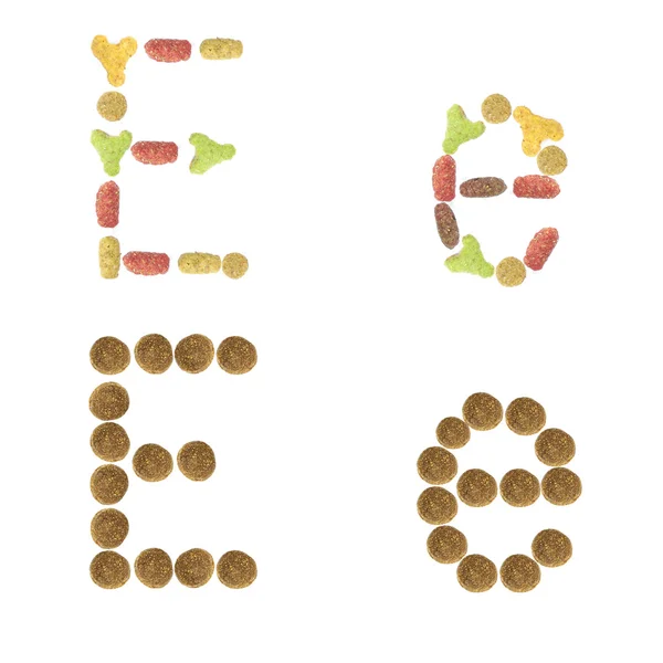 Punctuation marks of dry cat and dog food, isolated on white background — Stock Photo, Image