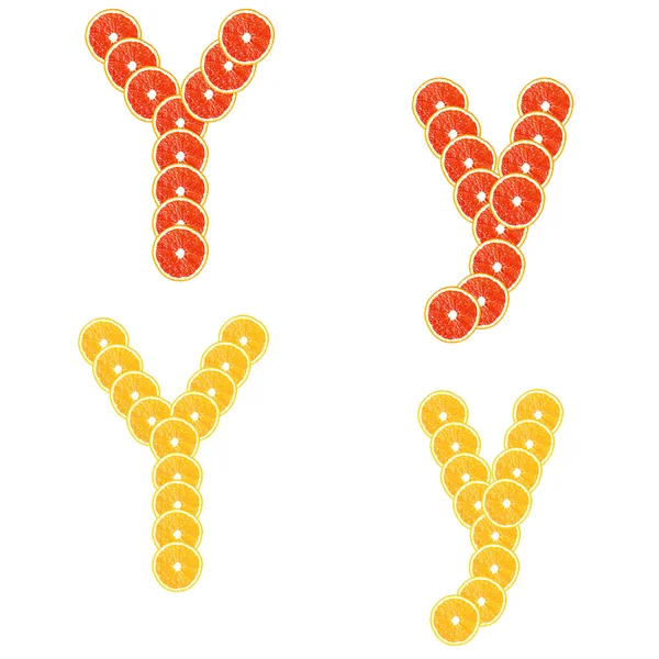 Buchstaben gestapelt Orangen- und Grapefruitscheiben zu Alphabet — Stockfoto