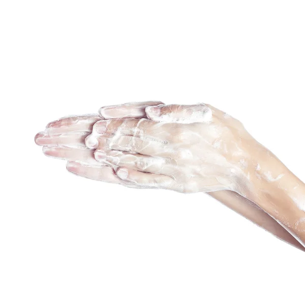 Woman washes her hands. pictured female hands in soapsuds. Isola — Stock Photo, Image