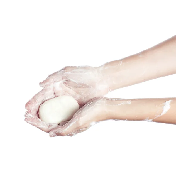 Woman washes her hands. pictured female hands in soapsuds. Isolated on white — Stock Photo, Image