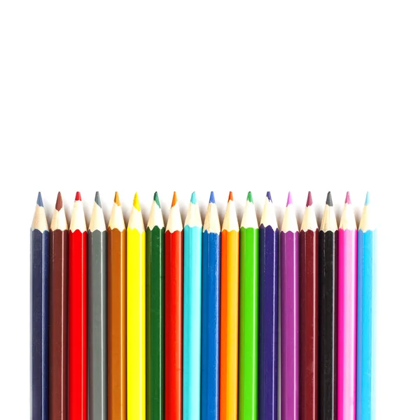 Різнокольорові олівці на білому тлі для створення колажу — стокове фото