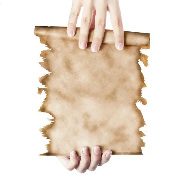 Hand hält eine gefaltete Rolle alten Papiers (Brief oder Einladung an — Stockfoto