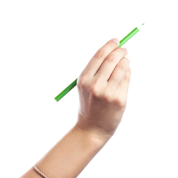 Colored pencils in a female hand on a white background . — Stock Photo, Image