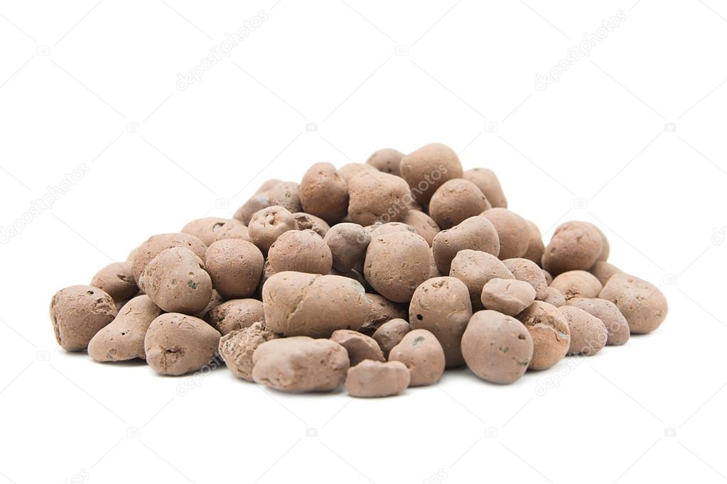 Pile of expanded clay drainage isolated on white