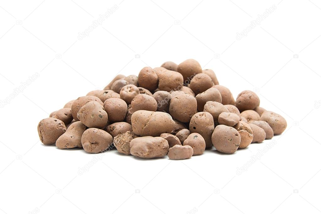 Pile of expanded clay drainage isolated on white