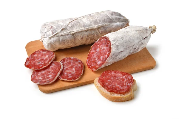 Salame on cutting board — Stock Photo, Image