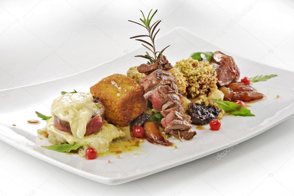 meat dish, variations cubes of steak, grilled, breaded, flavored