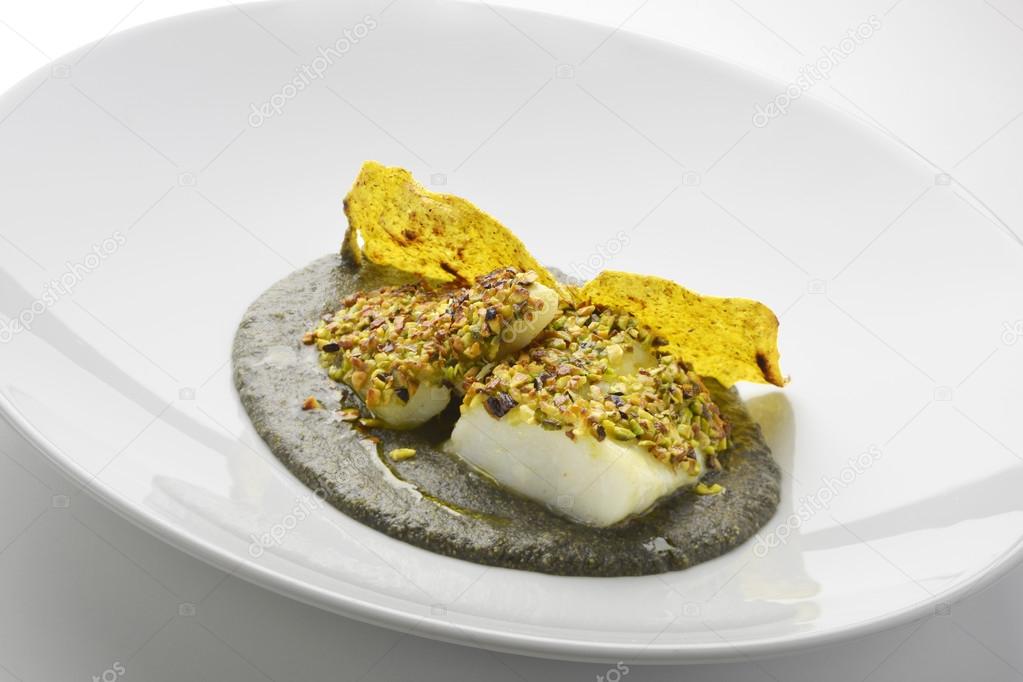 Salt cod crusted with pistachios and black polenta