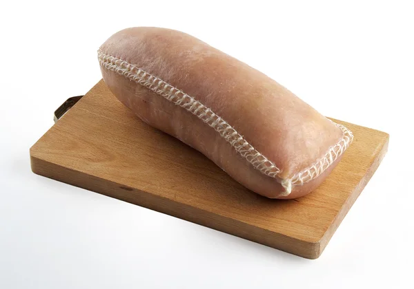 Saucisse Cotechino avec croûte sur planche à découper — Photo