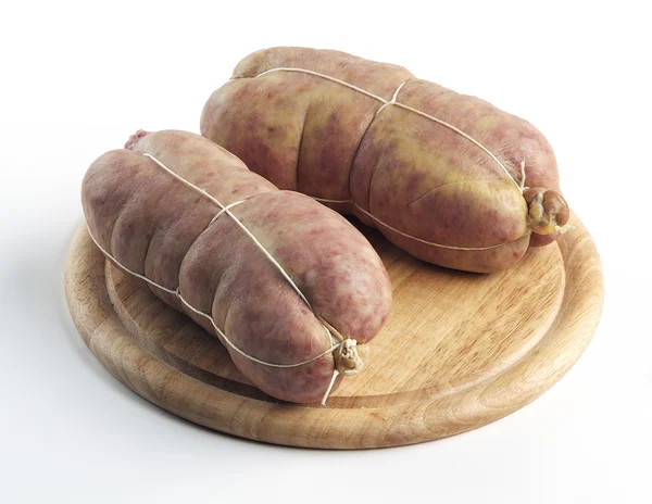 Salsicha Cotechino na tábua de corte — Fotografia de Stock