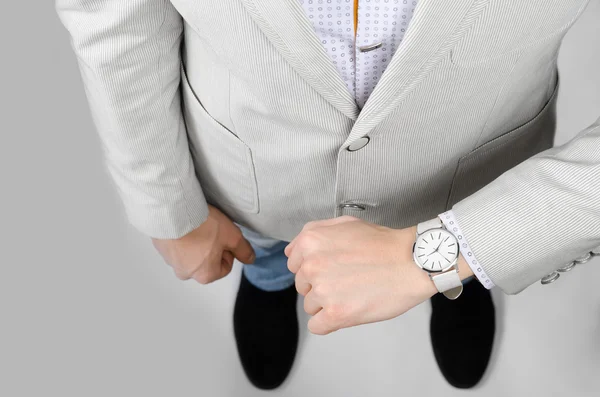 Stylish white wristwatches on the hand businessman Royalty Free Stock Photos