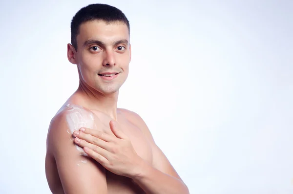 Young man burnt plaster sun skin cream — Stock Photo, Image