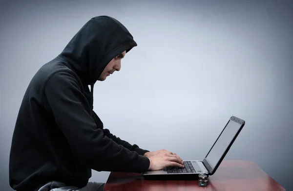 Hacker stealing data from computer — Stock Photo, Image