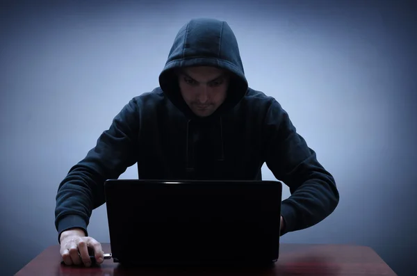 Hacker stealing data from computer — Stock Photo, Image