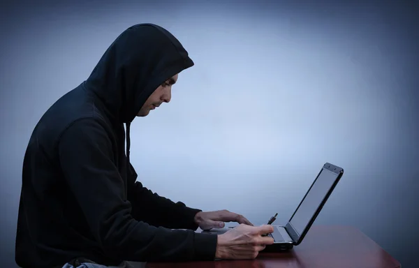 Hacker stealing data from computer — Stock Photo, Image