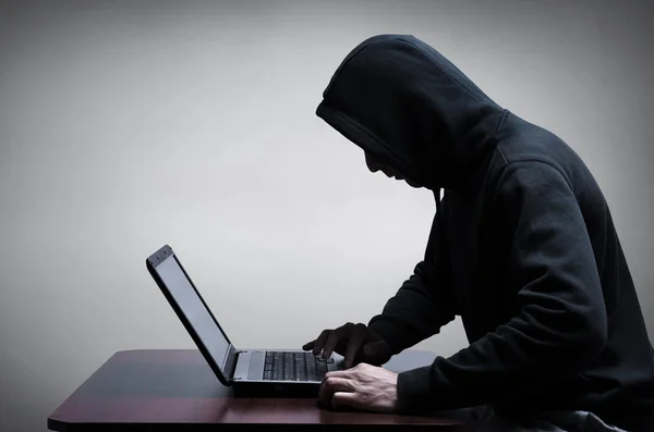 Hacker stealing data from computer — Stock Photo, Image