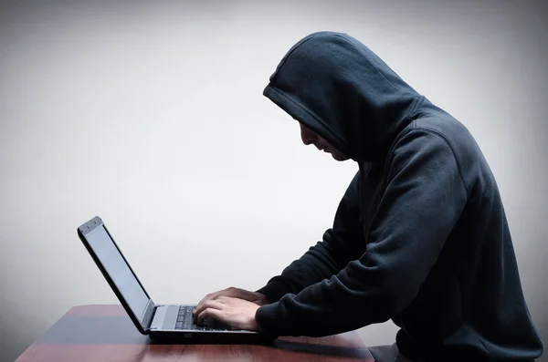 Hacker stealing data from computer — Stock Photo, Image