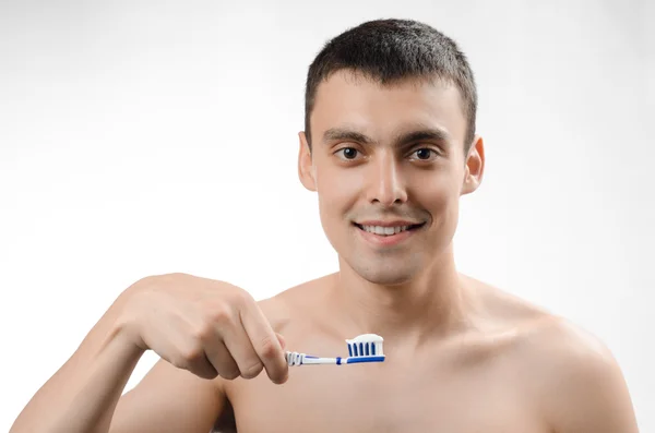 Man brushing his teeth — Stock Photo, Image