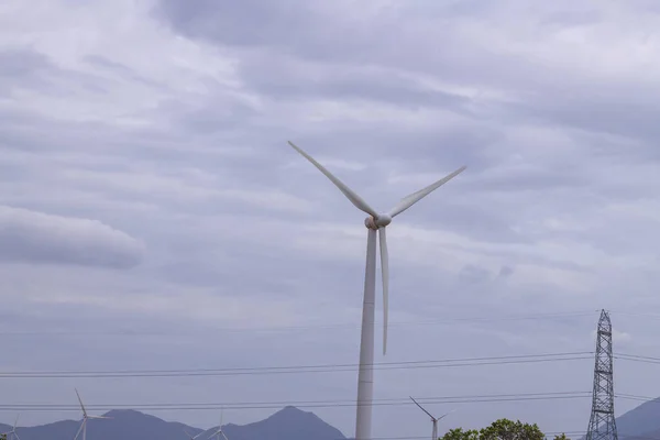 Wind turbine with propeller close up shot with isolated background with sky. Wind turbine isolated with copy space available