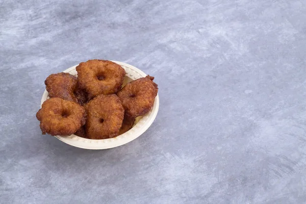 Homemade Adhirasam - South Indian Diwali and festival snack sweet. Also called peneram, Kuih Denderam. Traditional dish made rice flour and jaggery. Malaysia,India, Srilanka dis