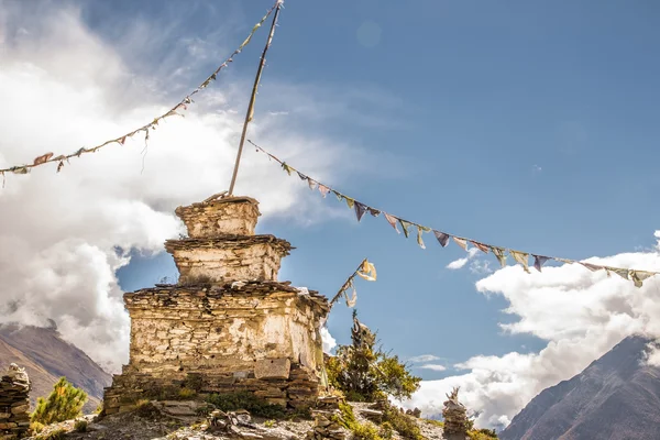 Stupa at the mountain with nepalese flags — Stock Photo, Image