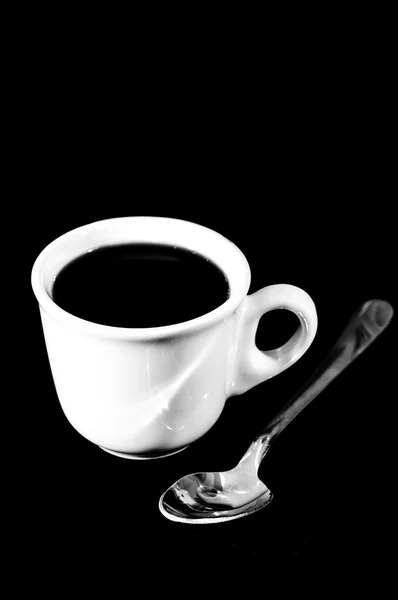 Cup of coffee on black background — Stock Photo, Image