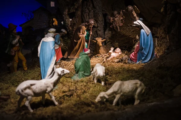 Christmas Manger scene with figurines including Jesus, Mary, Jos
